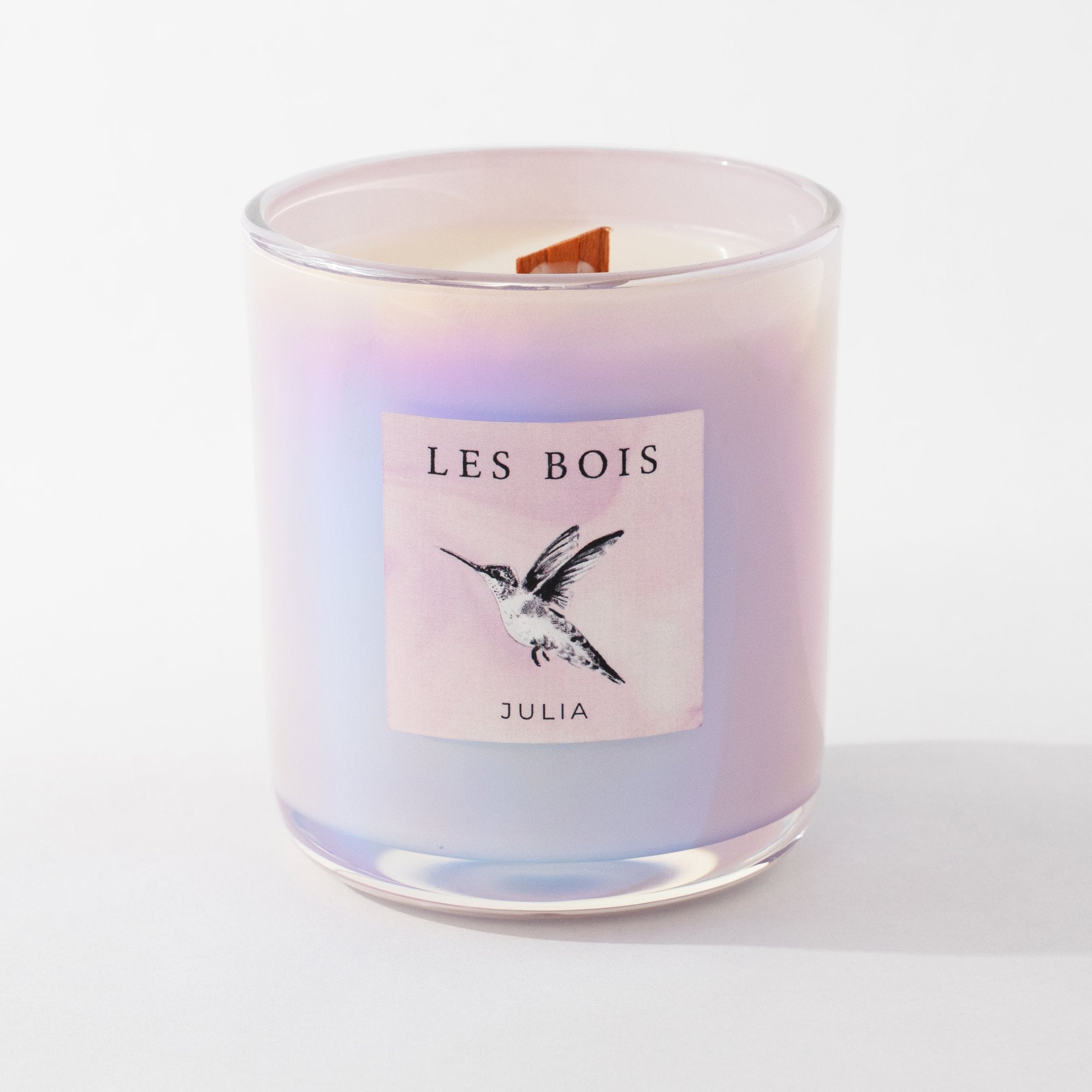 Candle with 'Les Bois' label on a white background