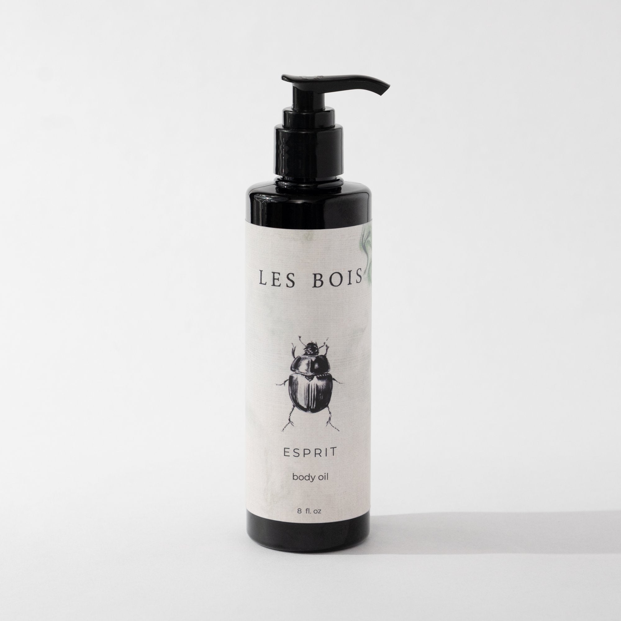 Les Bois Esprit body oil bottle on a white background