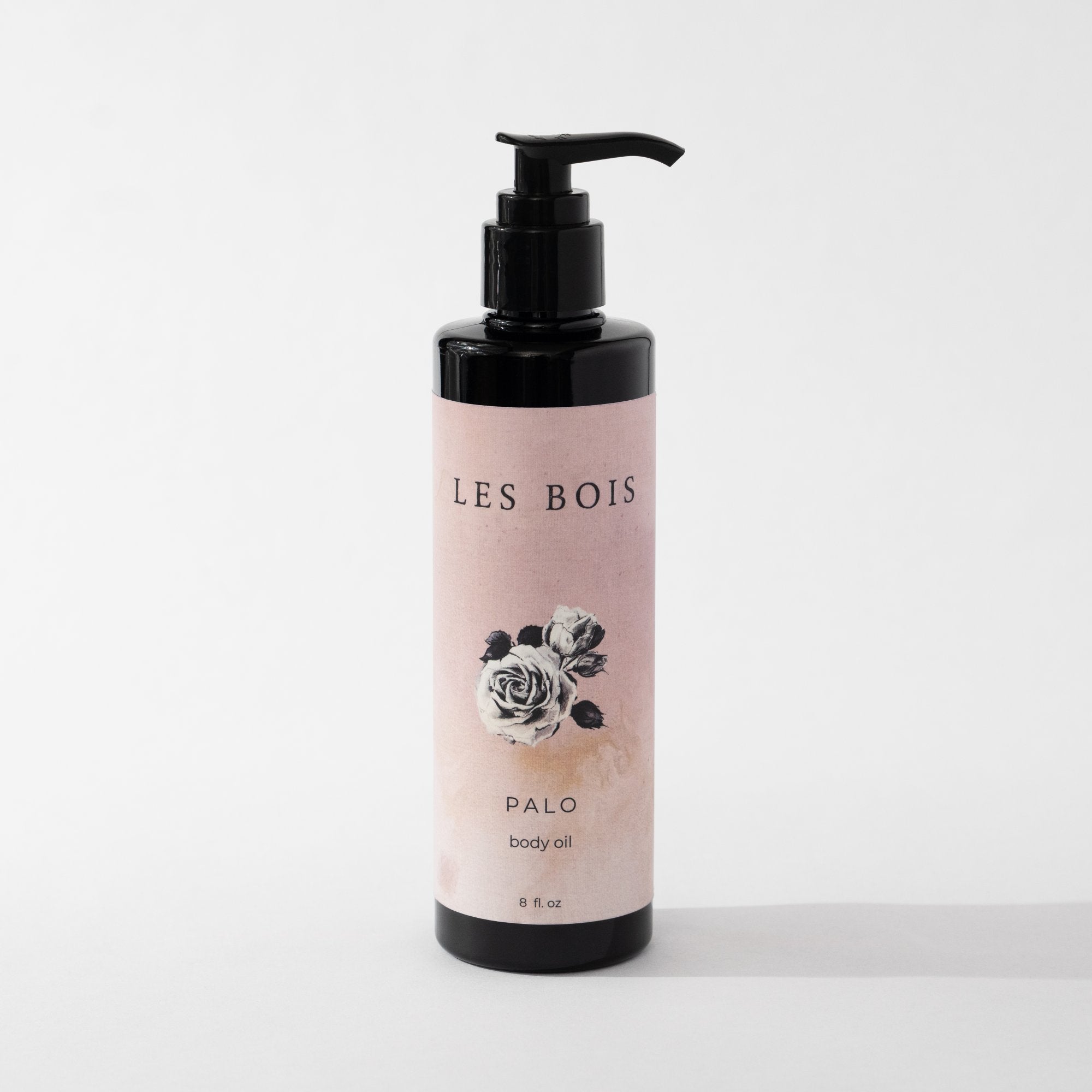 Les Bois Palo body oil bottle on a white background