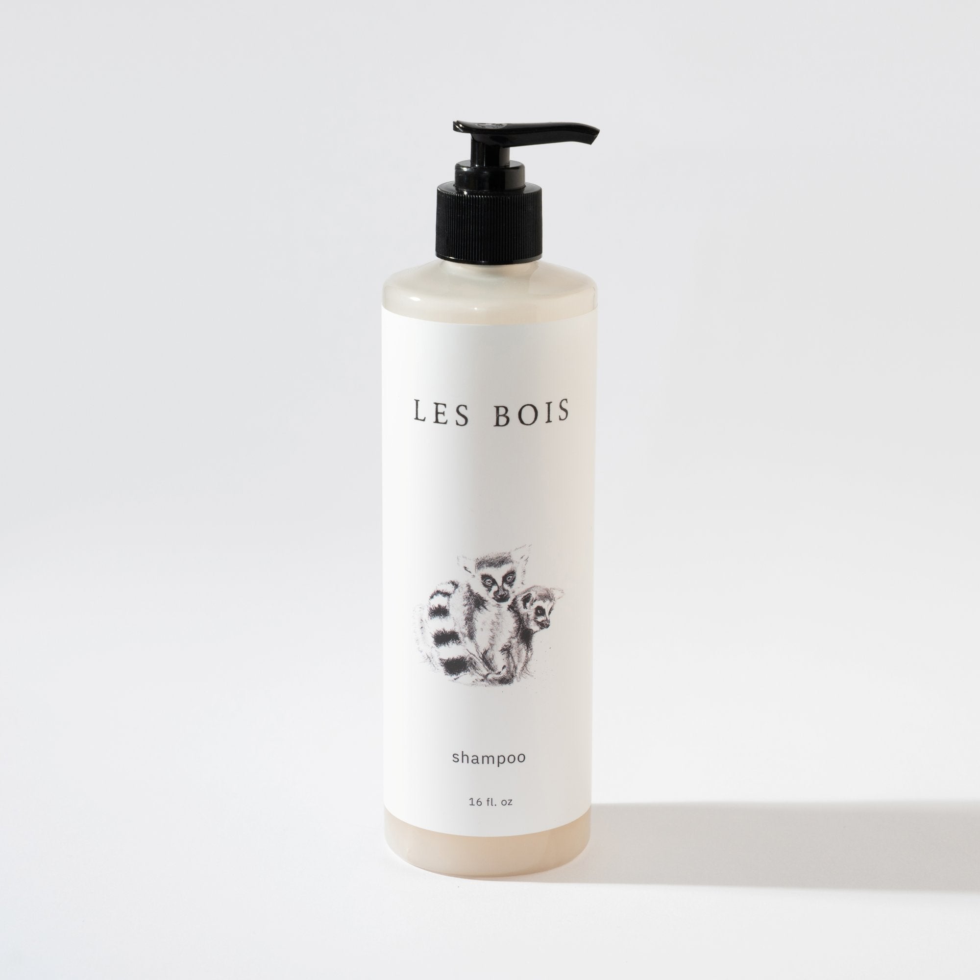 Shampoo bottle with 'Les Bois' branding on a white background